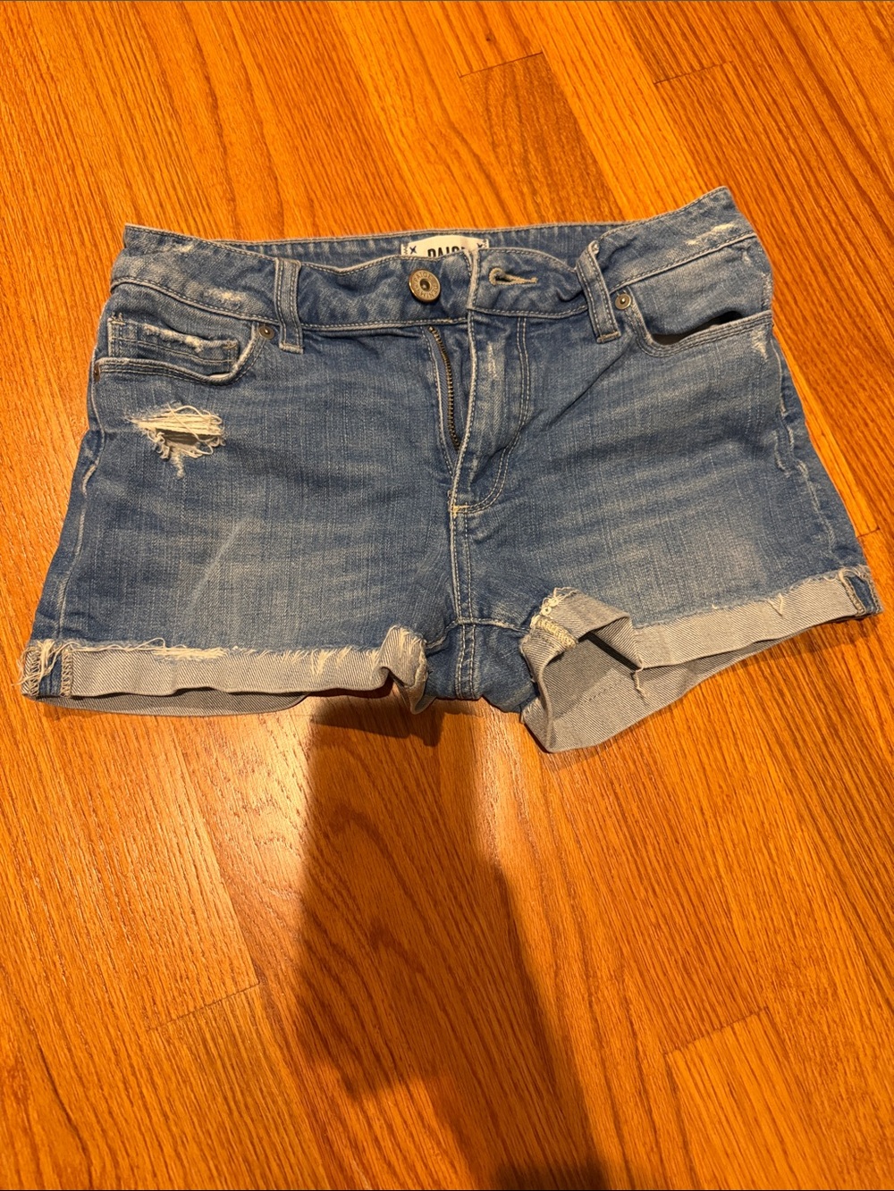 PAIGE Light Blue Distressed Roll-Hem Jean Shorts